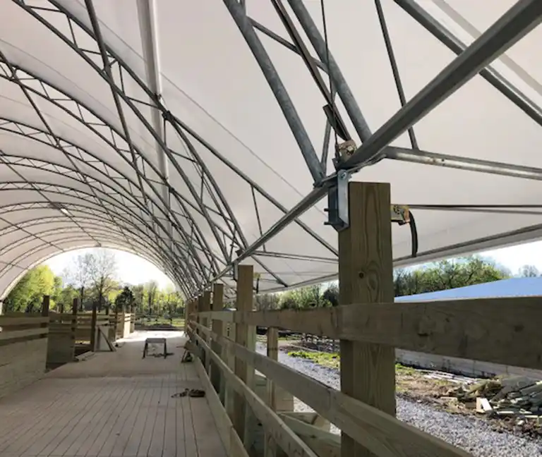 inside view of a side awning on a livestock hoop building